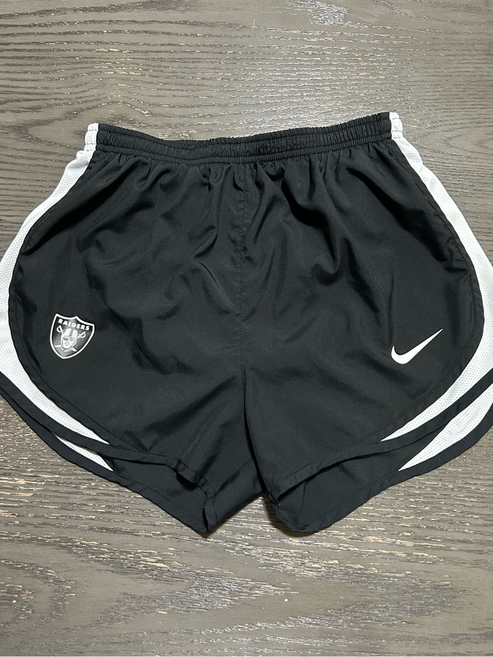 Nike Women's Black Athletic Shorts with Las Vegas Raiders Accents and Swoosh